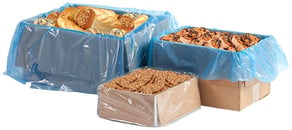 boxes lined with bakery items